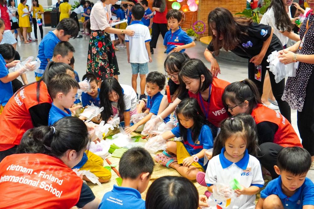 VFIS students excitedly making the moon cakes for the first time