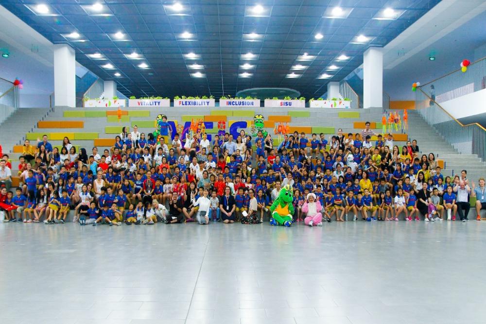 eachers and students posing for a group photo of the first unforgettable and happy festival at VFIS