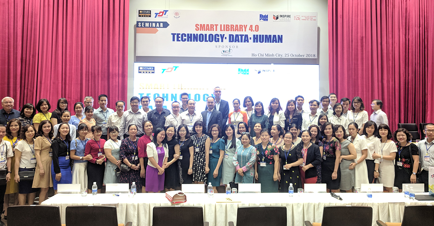 Participants are taking group photo.  