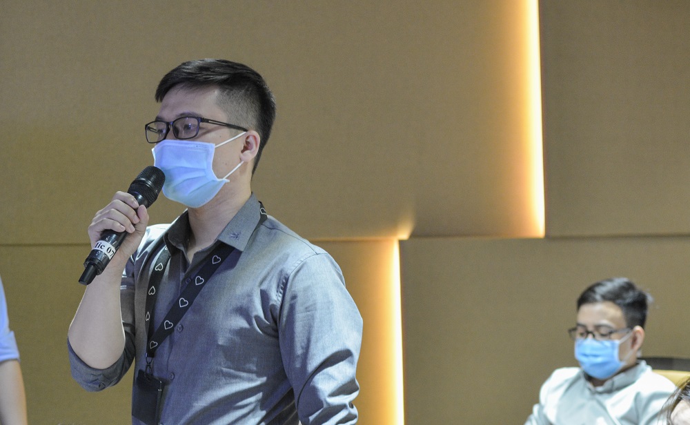 A representative of students asking questions.