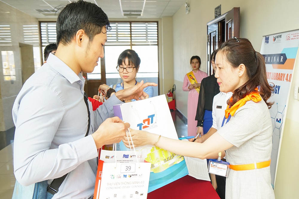 Participants registering at the conference